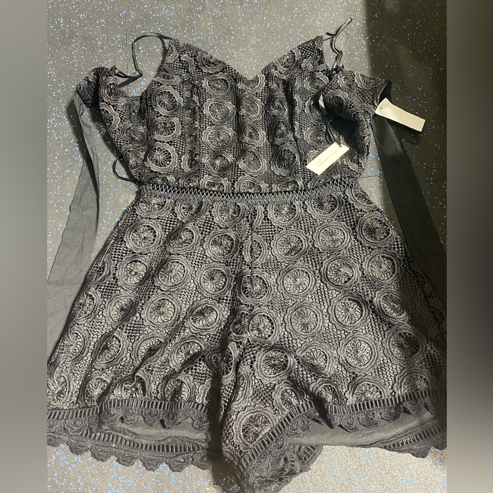 NWT size small lovers and friends romper